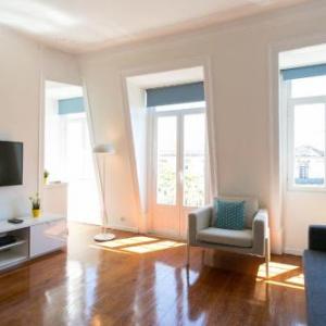 Sunny photographers attic in Alcantara w stunning view Lisbon 