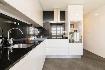 Modern deco apartment with balcony - image 3