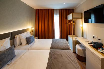 Duplo Charme Boutique Hotel - image 19
