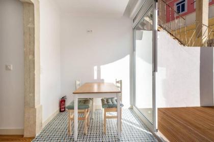 1bd Industrial-Styled Home in Lisbon by GuestReady - image 12