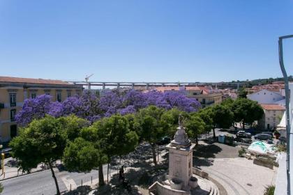 Sunny photographer’s attic in Alcântara w/ stunning view - image 3