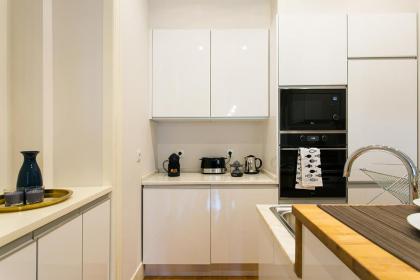 LovelyStay - Cozy 3BDR Apartment in Estrela - image 12